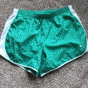 Green Nike shorts